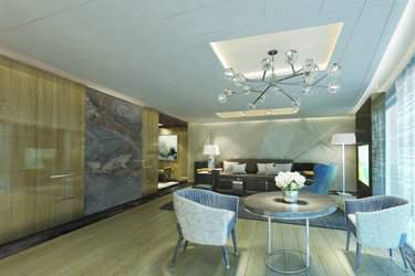 ncl_Encore_Haven Deluxe Owner Suite H2 Livingroom.jpeg